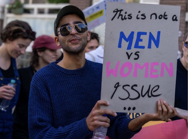 Protesters marching at the Women's March 2025 demonstration, photographed by Magali Meijers